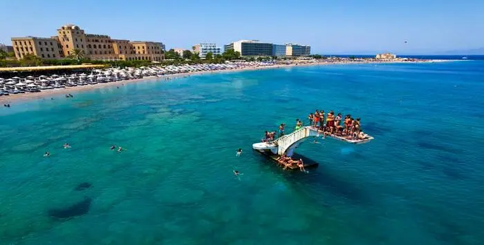 Elli Beach in Rhodes Greece with crystal clear water and beach promenade
