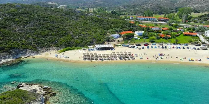 Kalamitsi Beach in Sithonia, Greece with crystal clear turquoise water and sandy shoreline