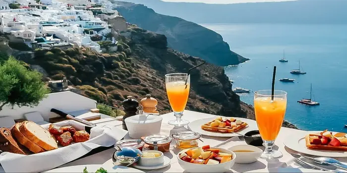 Things to do in Santorini including caldera views, white villages, blue domes and the Aegean Sea